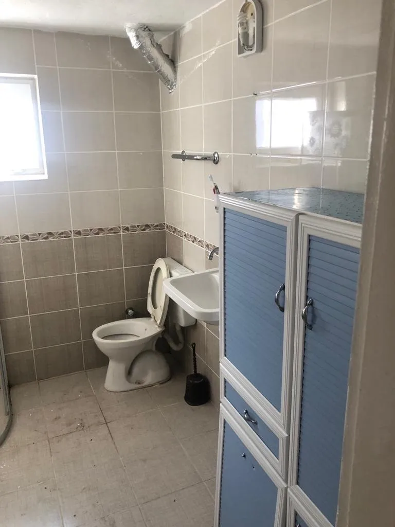 AKÇAABAT CEZAEVİ KARŞISINDA SATILIK 2+1 90 M2 4. KAT DENİZ MANZARALI 95.000 TL — görsel 1